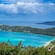 A tranquil bay in a lush tropical setting
